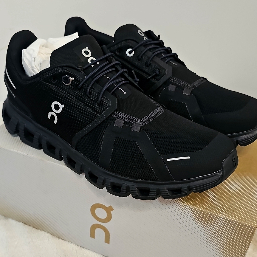 On Running Black Athletic Shoes with Rugged Design